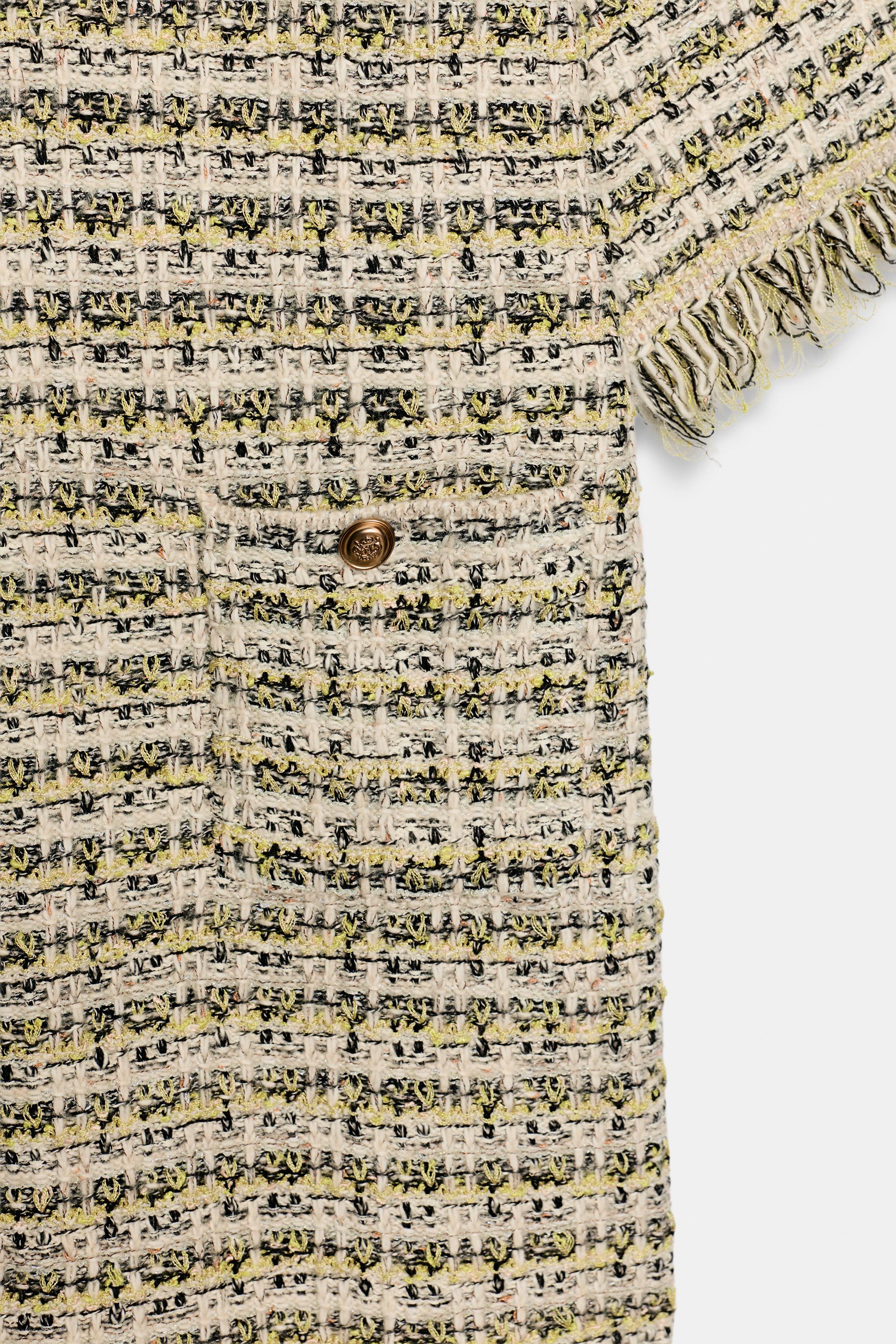 ROBE EN MAILLE STRUCTURÉE EFFRANGÉE